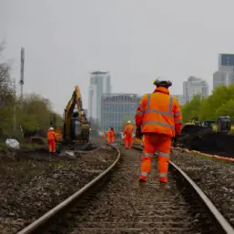 Rail maintenance team in hi-vis working on the tracks